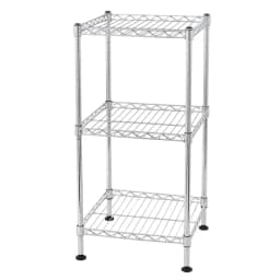 Chrome three-tier wire shelving rack with four posts and black feet on a white background